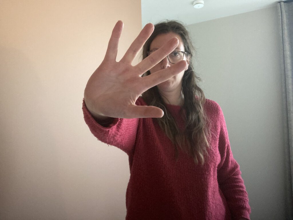 Hand voor gezicht